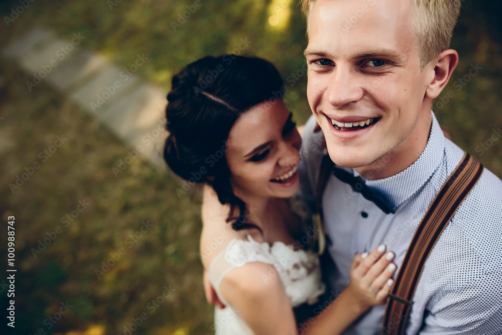Fototapeta premium Beautiful wedding couple posing