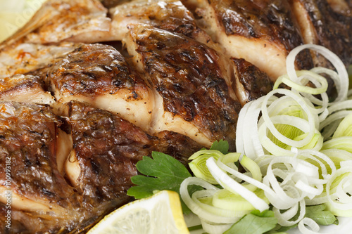 Roasted carp fish with vege...
