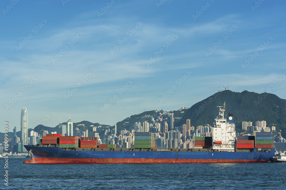 Container ship in Victoria Harbor of Hong Kong Container ship in Victoria Harbor of Hong Kong