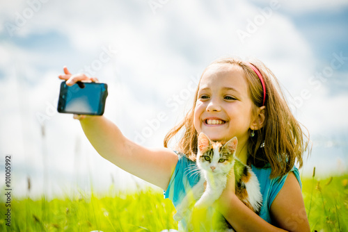 Selfie child and cat