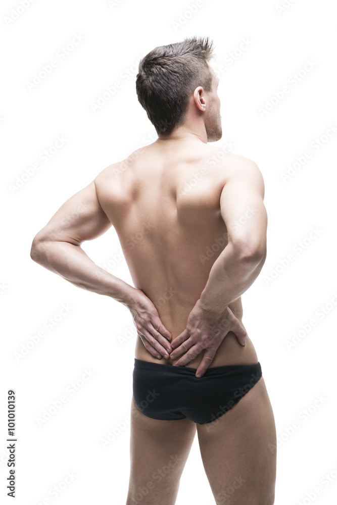 Man with backache. Pain in the human body. Muscular male body. Isolated on white background Man with backache. Pain in the human body. Muscular male body. Isolated on white background