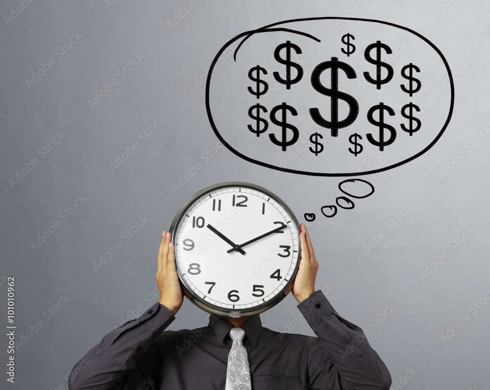 Businessman is holding clock  of head
