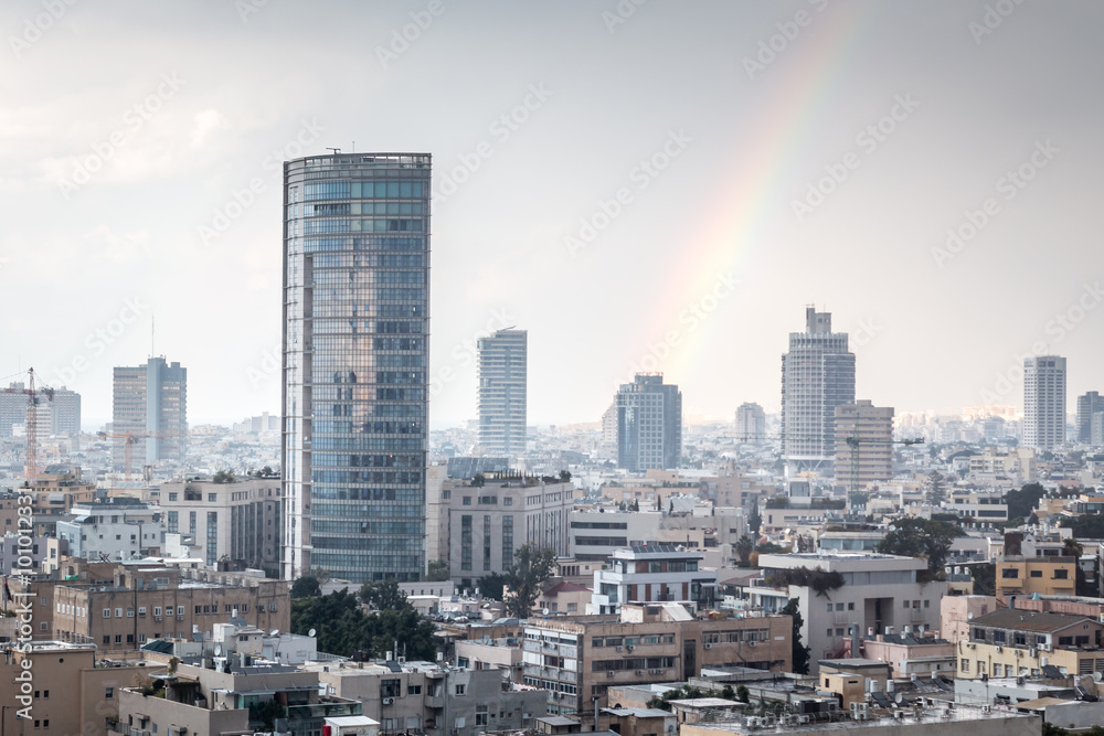 modern cityscape view with rainbow