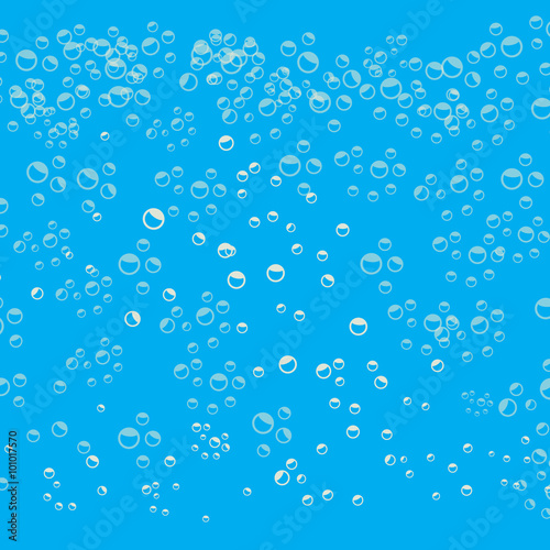 Bubbles in water on blue background