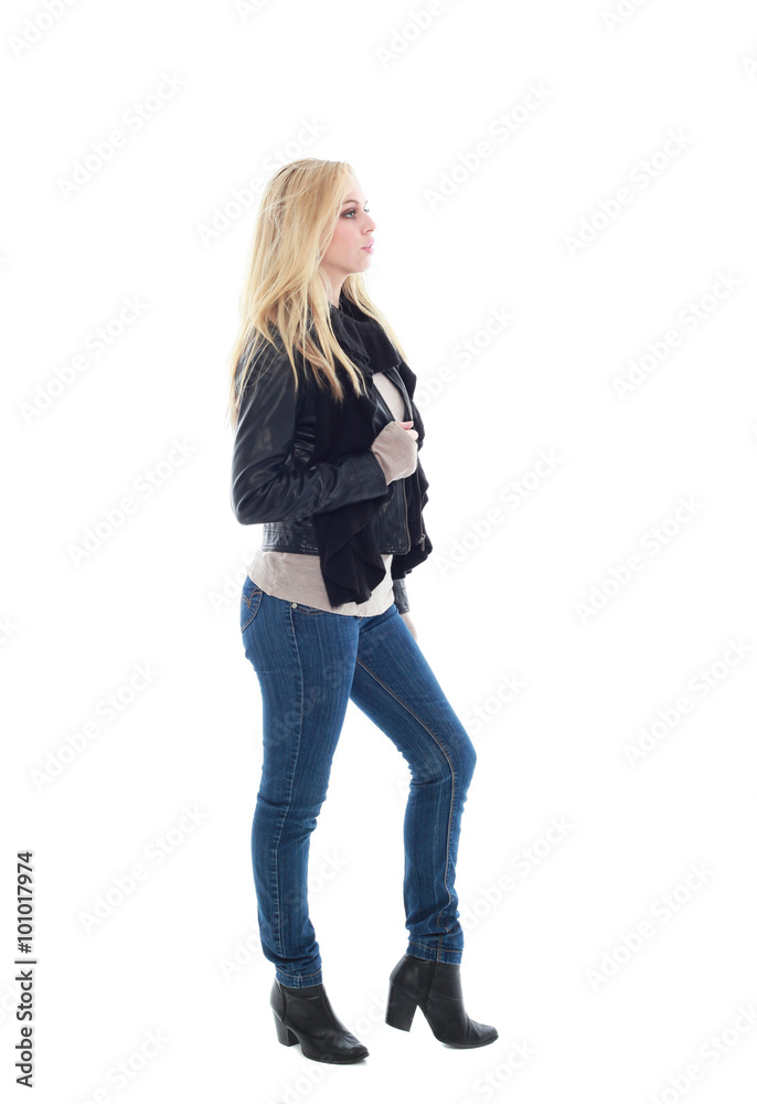 beautiful blonde woman wearing leather jacket and blue jeans, standing pose. isolated on white background. beautiful blonde woman wearing leather jacket and blue jeans, standing pose. isolated on white background.