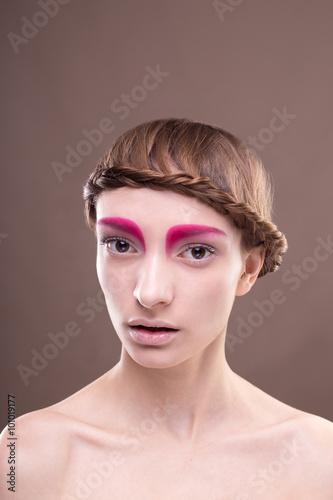 Close-up portrait of a young woman. Beautiful makeup.