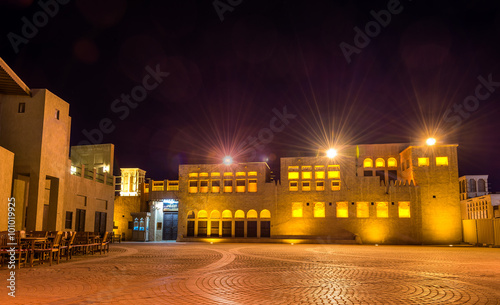 Traditional architecture houses in Creek district of Dubai photo