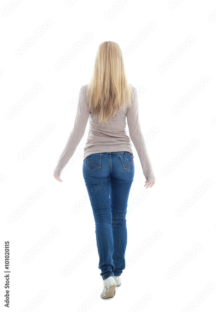 beautiful young woman with long blonde hair wearing a long sleeved cream shirt and gold necklace. standing pose, isolated on white background. beautiful young woman with long blonde hair wearing a long sleeved cream shirt and gold necklace. standing pose, isolated on white background.