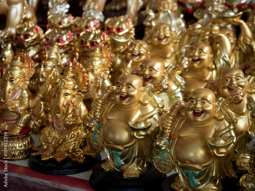 Figurines of Buddha for sale at souvenir shop