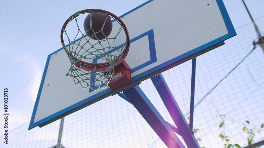 Young, athletic guy trains on sports site. Young, athletic guy trains on sports site.