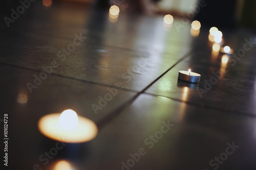 beautiful candles in a shape of a heart on the floor, wedding ce