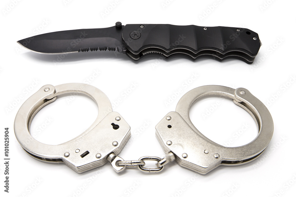 Handcuffs and knife Handcuffs and knife