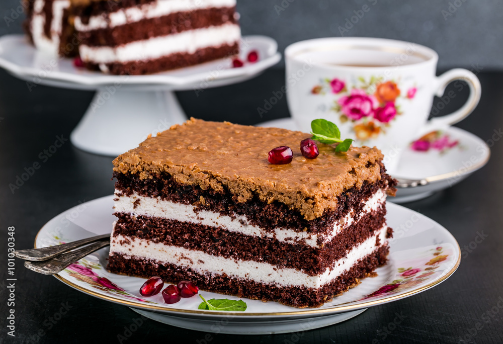 Chocolate cake stuffed with whipped cream and crunchy topping Chocolate cake stuffed with whipped cream and crunchy topping
