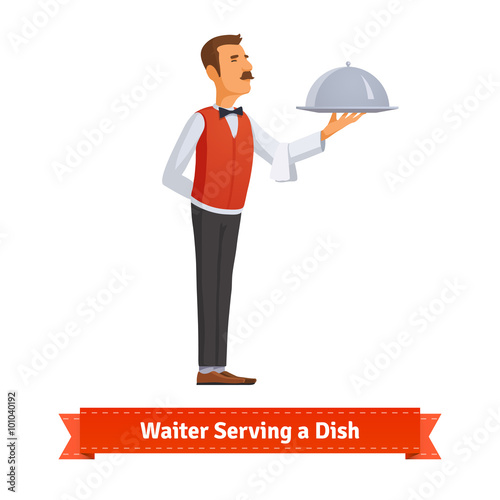 Waiter in a bow-tie serving dish on silver platter