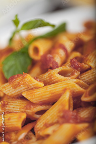 penne pasta in tomato dressing photo