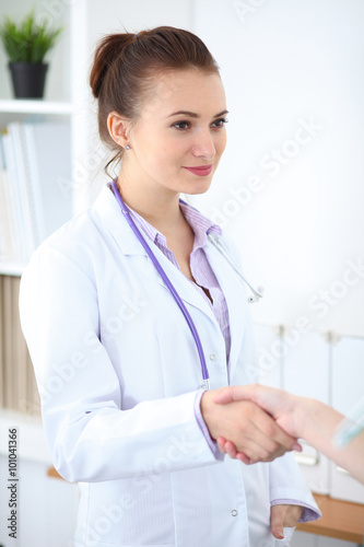 Two doctors handshaking