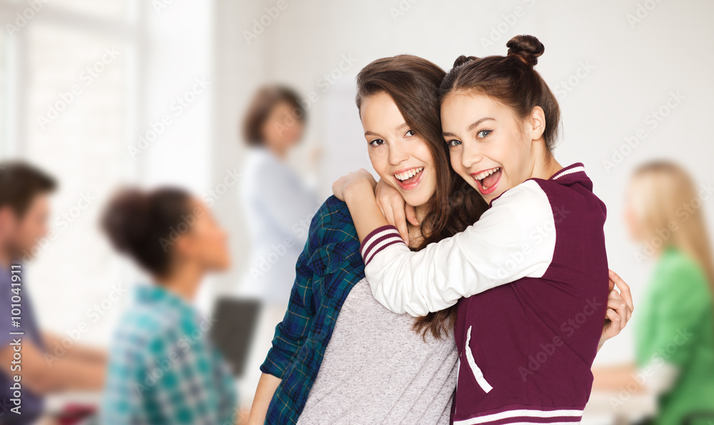 happy teenage student girls hugging at school happy teenage student girls hugging at school