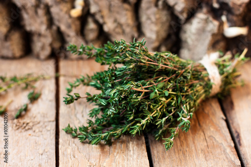 fresh thyme on a wooden background