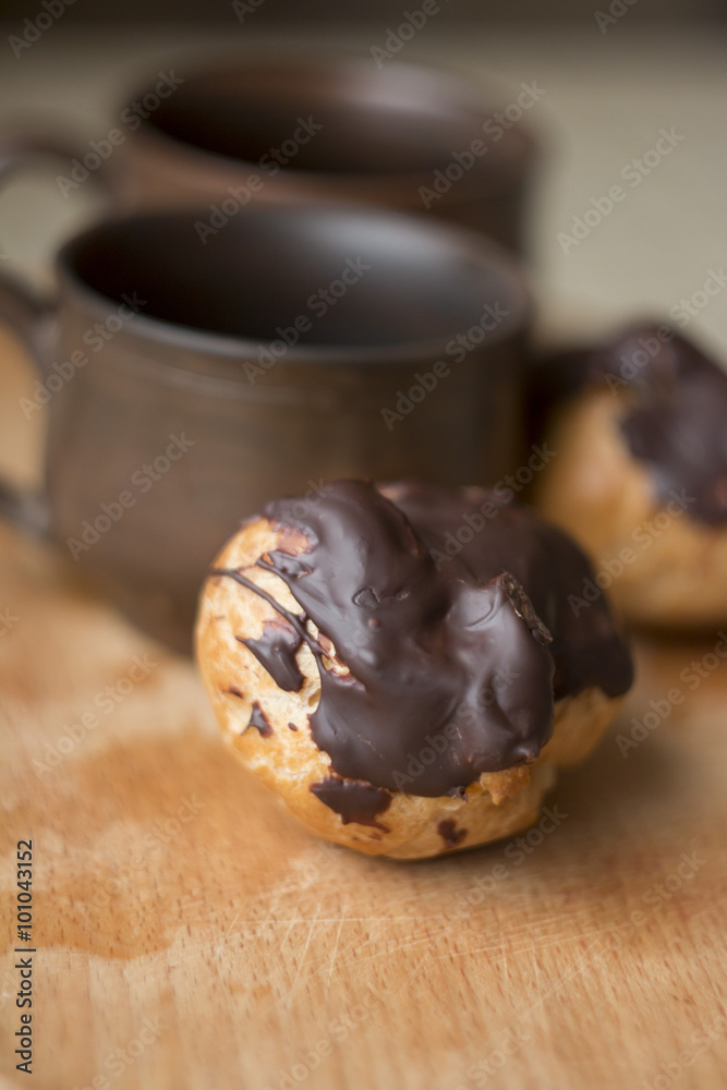 eclair with cup of coffee eclair with cup of coffee