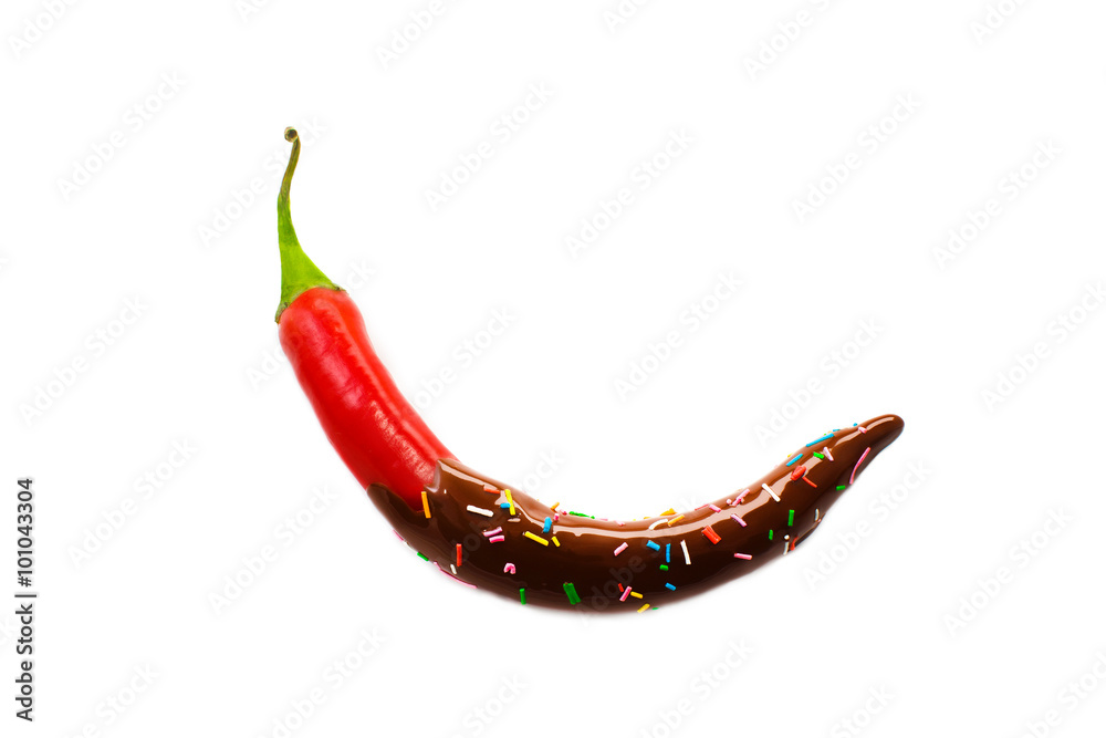 bitter and sweet. pepper in chocolate. red hot chili pepper with chocolate  with sugar sprinkle dots. food porn concept. Isolated on white background  Stock Photo | Adobe Stock