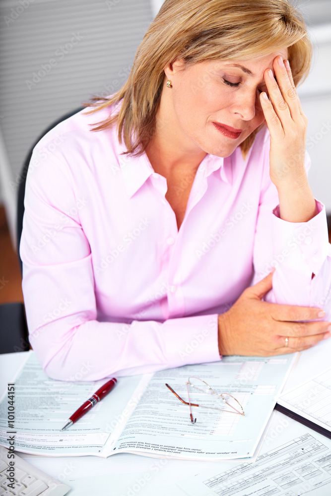 Mature business woman having headache. Mature business woman having headache.