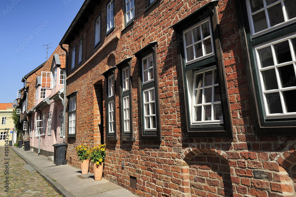 nice street with old brick houses, Lubeck, Germany