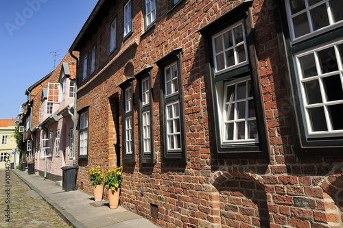 Fototapeta Naklejka Na Ścianę i Meble -  nice street with old brick houses, Lubeck, Germany