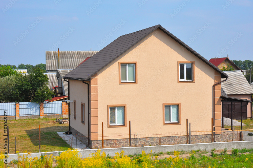 Construction or repair of the rural house with eaves, windows, roofing, fixing facade, insulation, plastering and painting. House construction. Construction or repair of the rural house with eaves, windows, roofing, fixing facade, insulation, plastering and painting. House construction.
