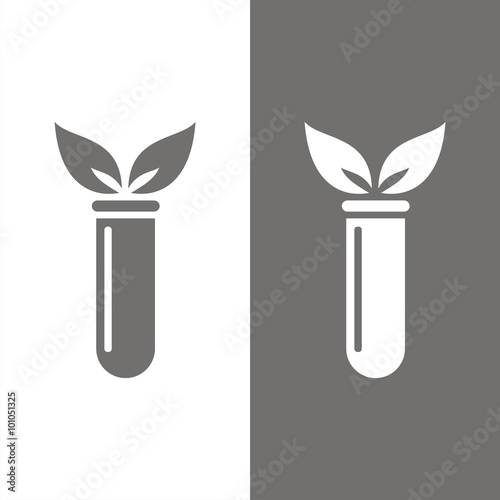 Icono de un tubo de ensayo con una planta. Concepto de biología, ciencia y laboratorio