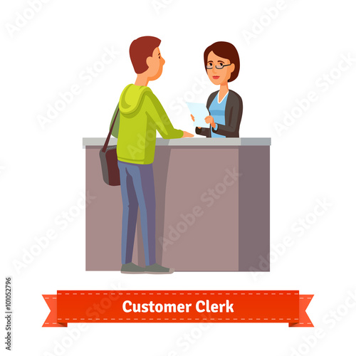 Assistant clerk working with customer