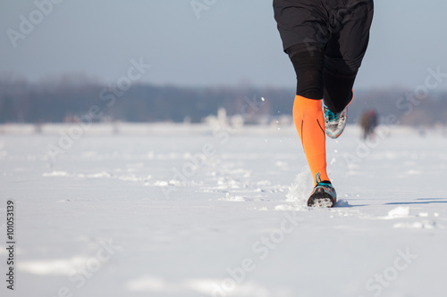 Winter jogging, running in the snow