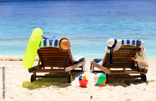 Fototapeta Naklejka Na Ścianę i Meble -  Two chairs on the tropical sand beach
