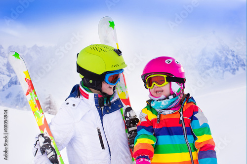 Kids skiing in the mountains