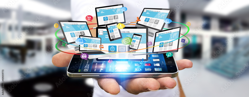 Businessman connecting tech devices Businessman connecting tech devices