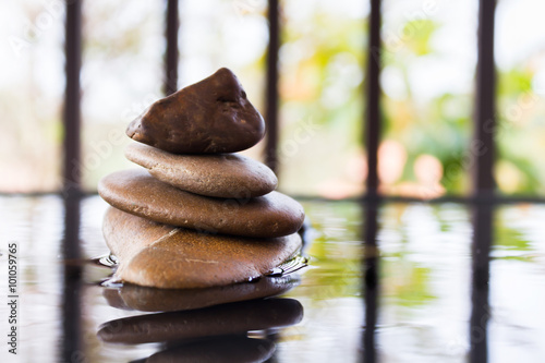 Photography Pebble on water in zen style background