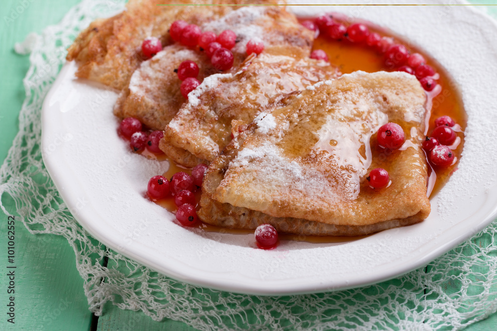 Fresh homemade crepes on plate with fresh berries Fresh homemade crepes on plate with fresh berries