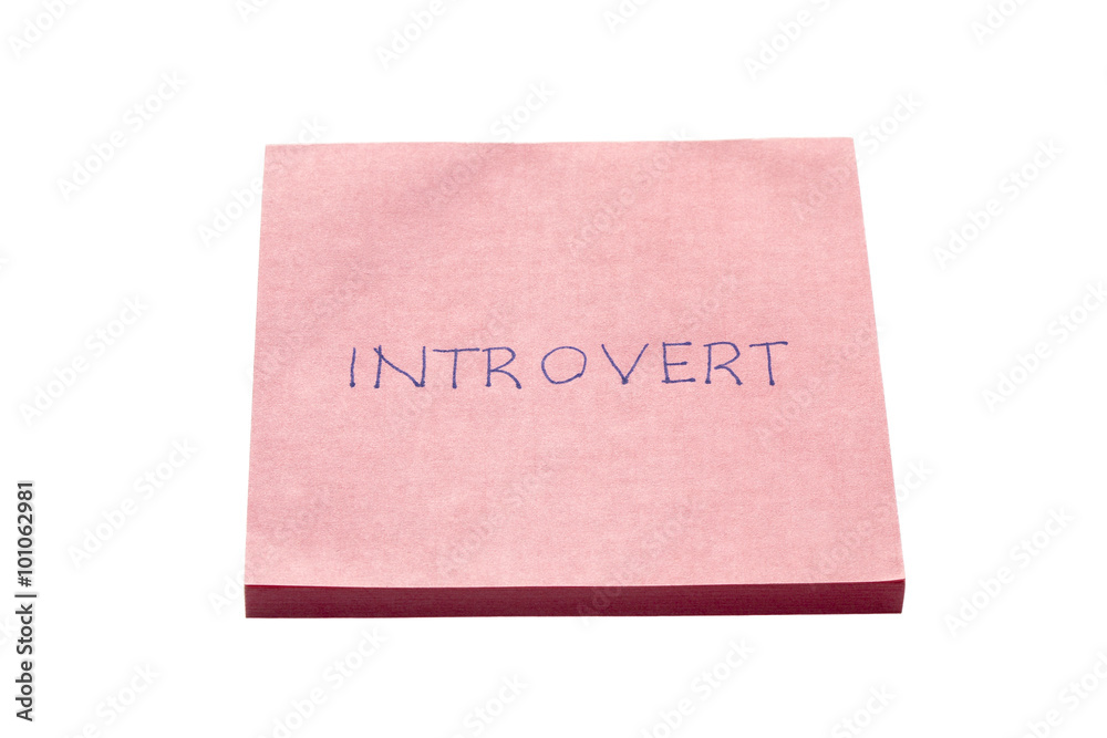Introvert written on remember note Introvert written on remember note