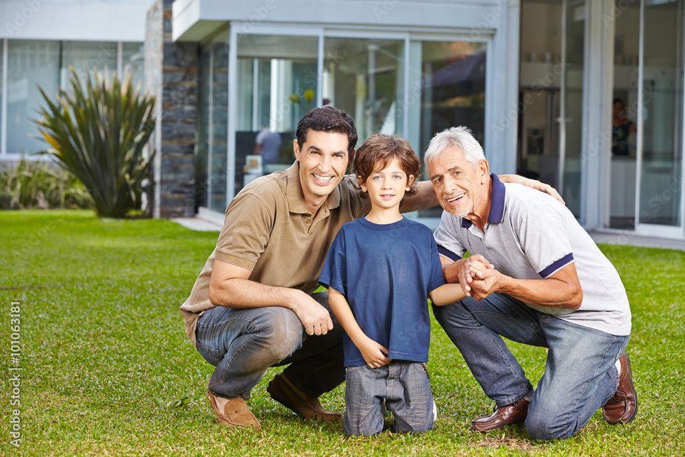 Child with father and grandfather in garden Child with father and grandfather in garden