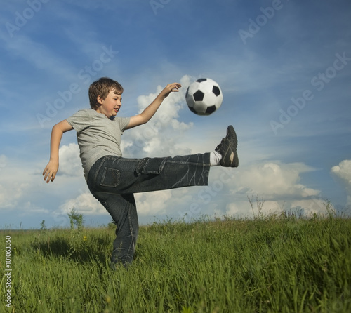 happy boy play in soccer