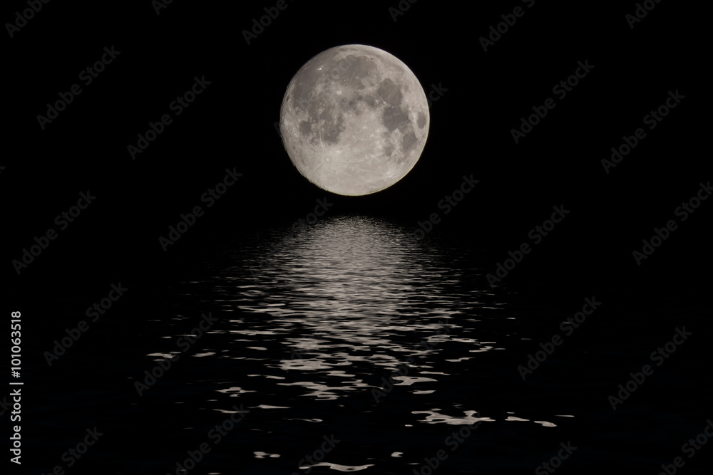 Fototapeta premium Full moon over dark black sky at night