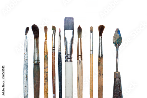 Old oil paint brushes isolated
