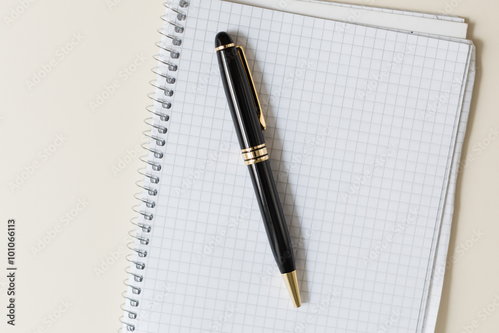 black pen with white pad or notepad black pen with white pad or notepad
