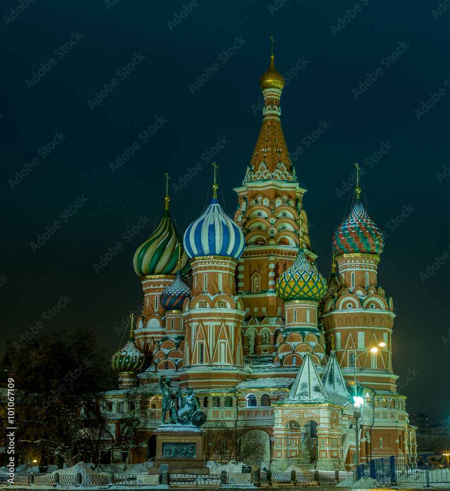 Cathedral of St. Basil covered in snow at night