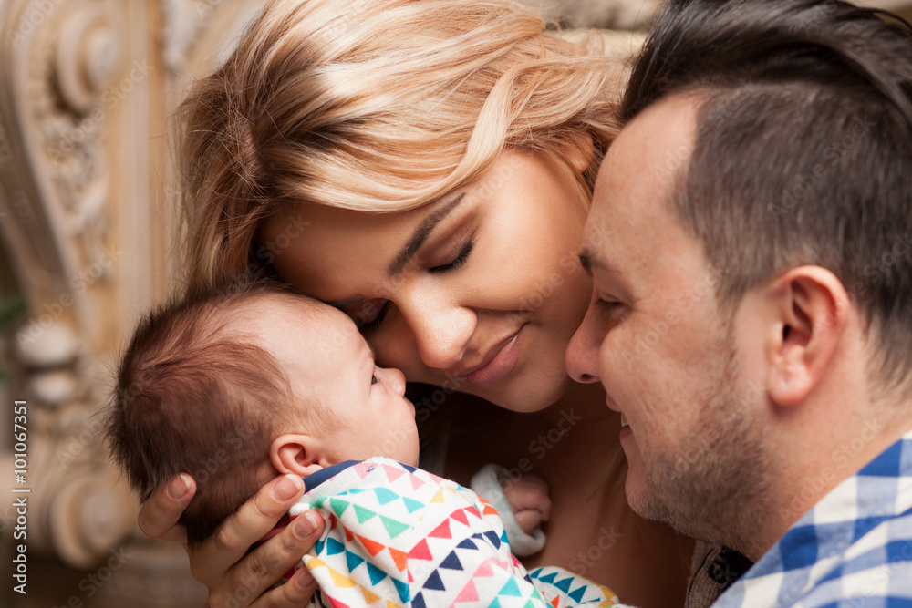 Family Enjoying newborn baby Family Enjoying newborn baby