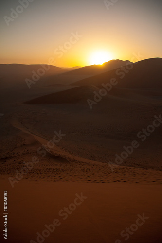 Sunrise above dunes in Namib Desert  Namibia