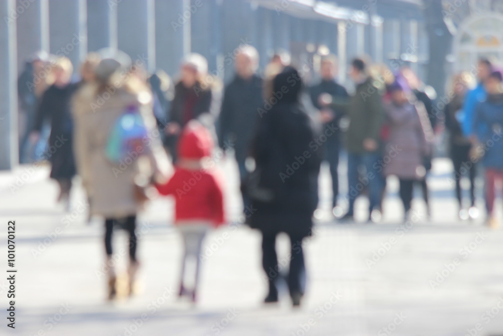 Blurred photo of unrecognizable person who walking along city street Blurred photo of unrecognizable person who walking along city street