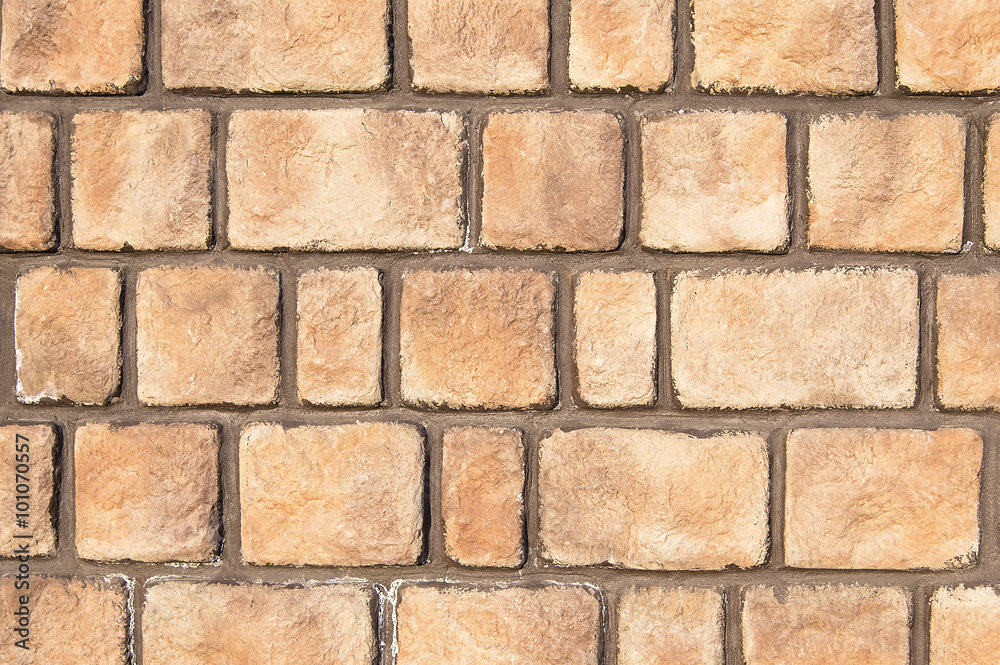 Obraz premium Light brown stone wall background texture