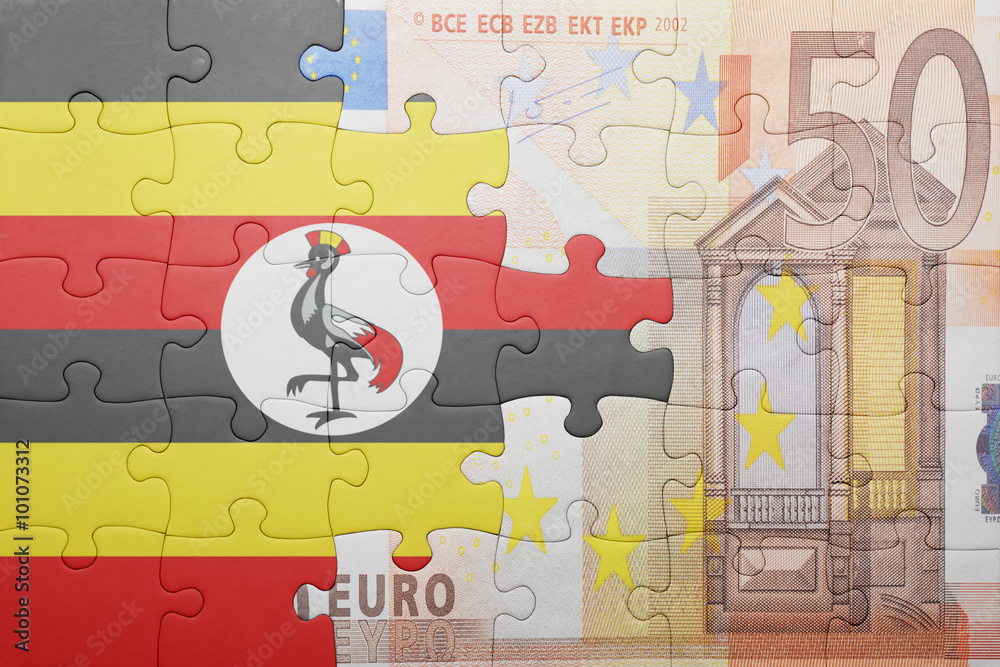 puzzle with the national flag of uganda and euro banknote