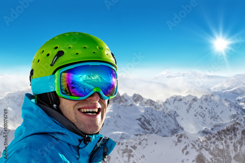 Portrait of skier during sunny day.