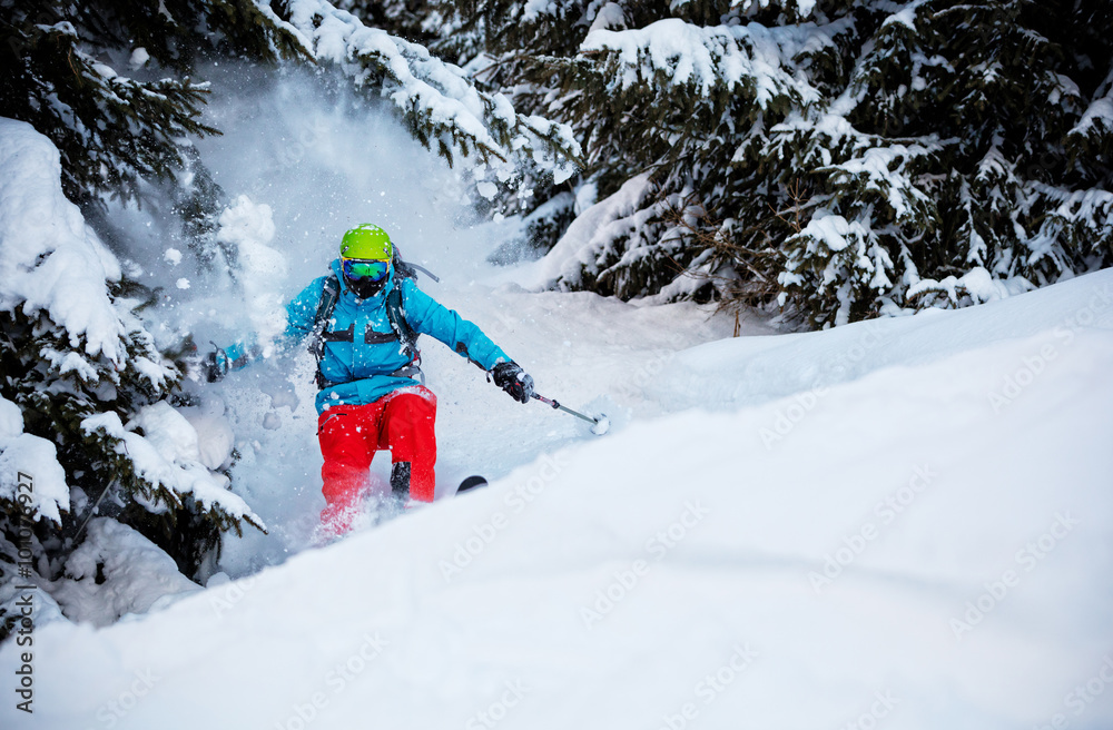 Man freerideer running downhill in forest Man freerideer running downhill in forest